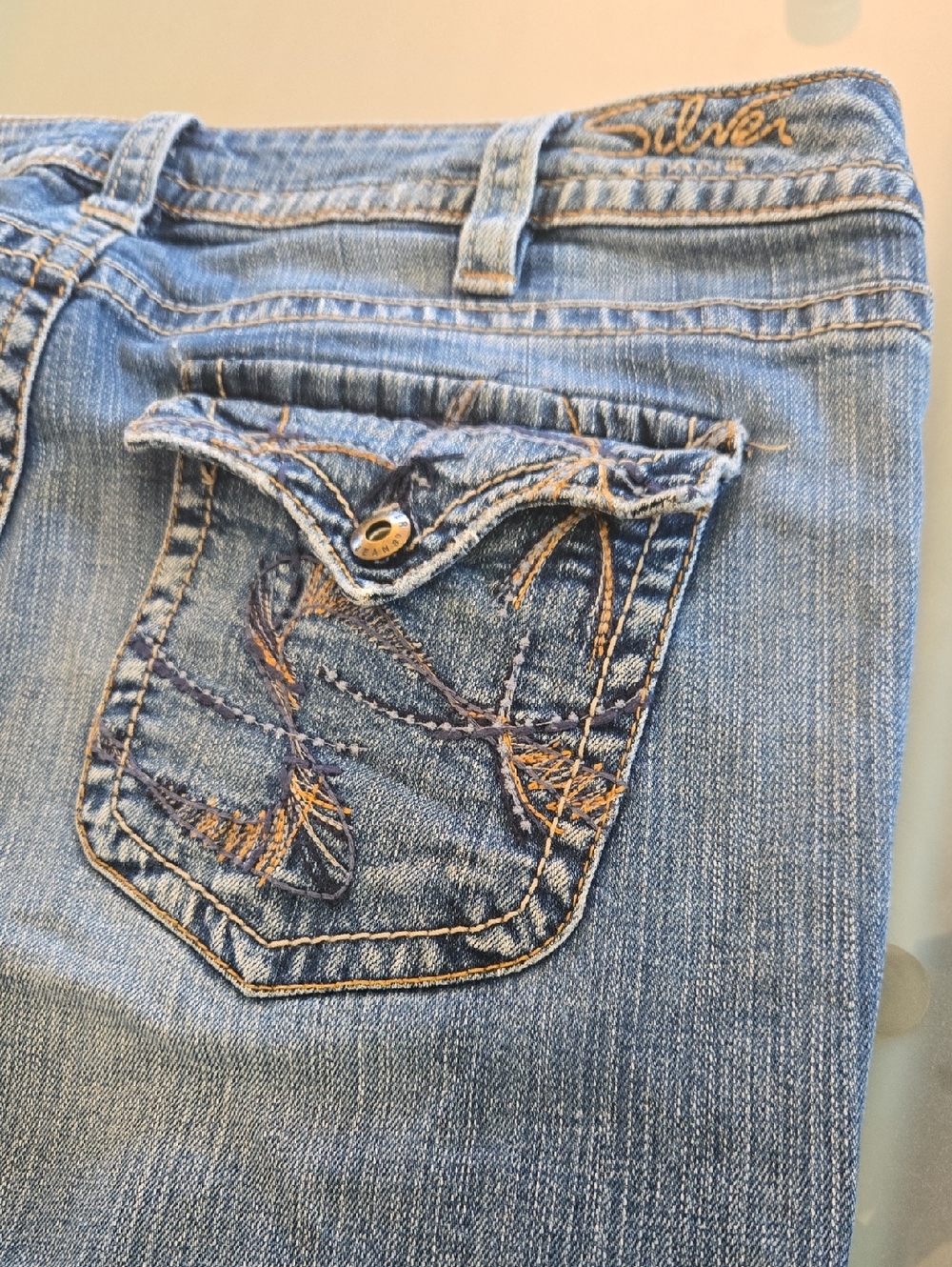 Silver Jeans Light Blue Denim Bootcut with Embroidered Back Pocket